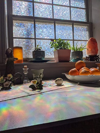 the prismatic window film applied to a kitchen window