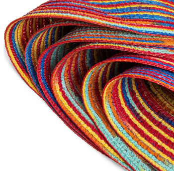 a stack of colorful placemats in the shape of a circle