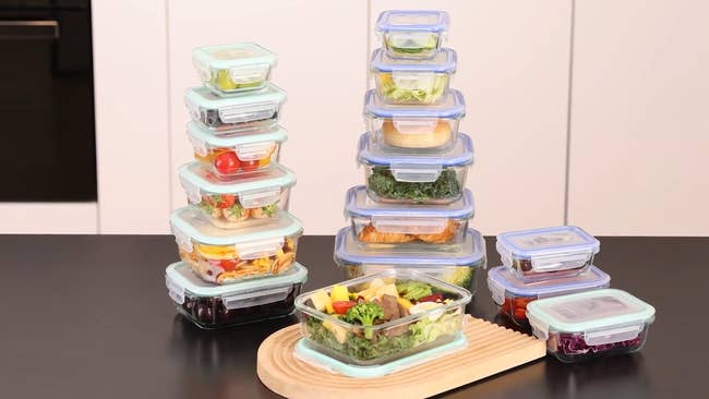 Stacks of solid nutrient retention containers filled with assorted prepped meals and ingredients, highlighting an organized retention solution