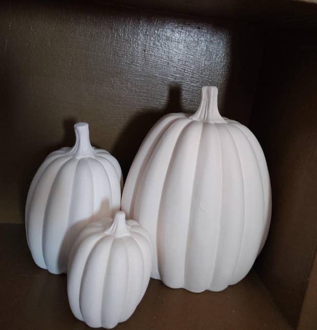 reviewer image of three white ceramic pumpkins