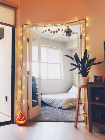 reviewer's moon phase garland hanging in the door frame