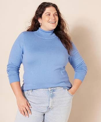 another model in the cornflower blue turtleneck sweater