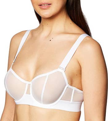 model wearing the bra in white, showing how it looks with the straps on
