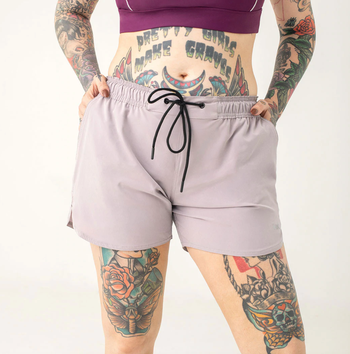 model wearing the shorts in pink