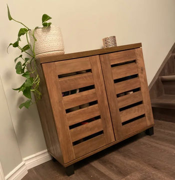 reviewer photo of brown closed shoe cabinet