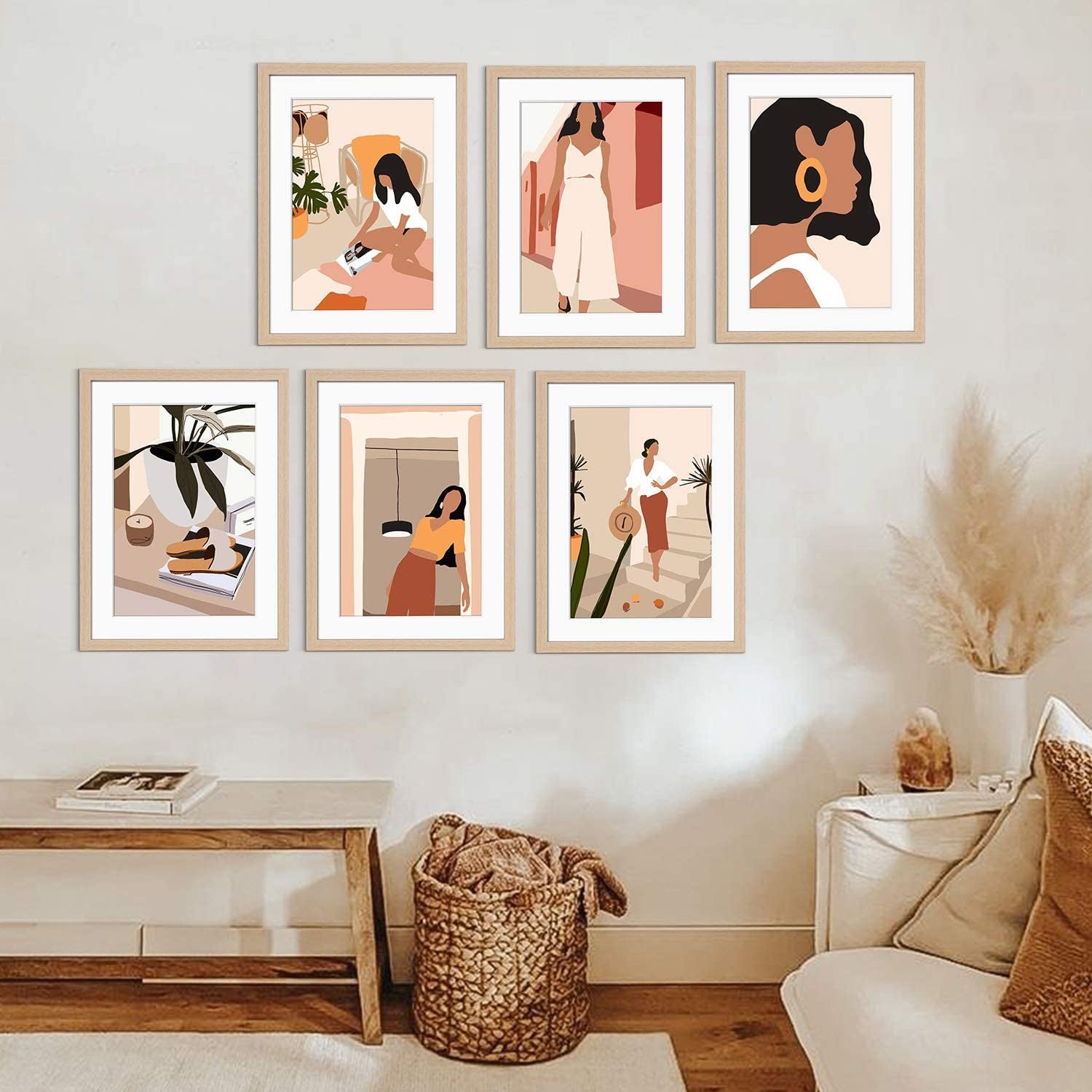 the six-piece set hanging on a white wall in wood frames