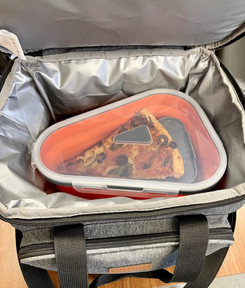 Pizza slices stacked in the container