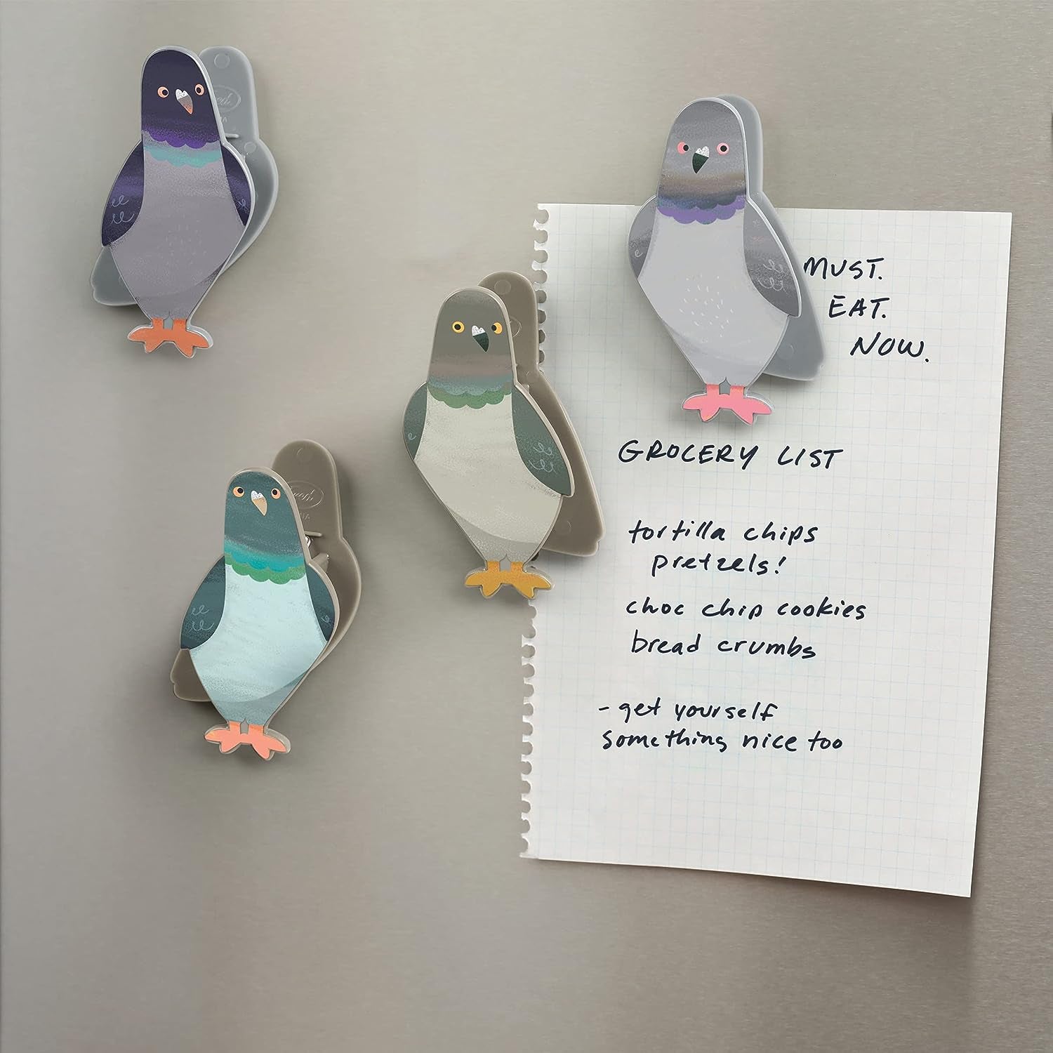 pigeon clips on fridge 