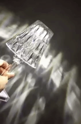 a gif from the seller showing how this lamp sparkles as light hits it