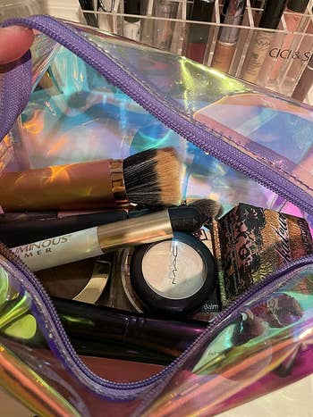 The makeup bag filled with different cosmetics