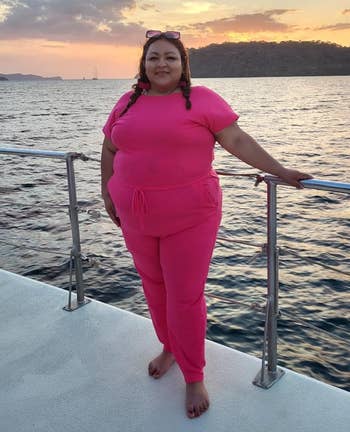 reviewer wearing the blistery pinkish version