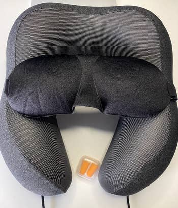Travel cervix  pillow and earplugs acceptable   connected  display