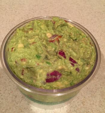 reviewer image of the guac inside that still looks green and fresh