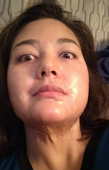 a reviewer showing the mask on their face