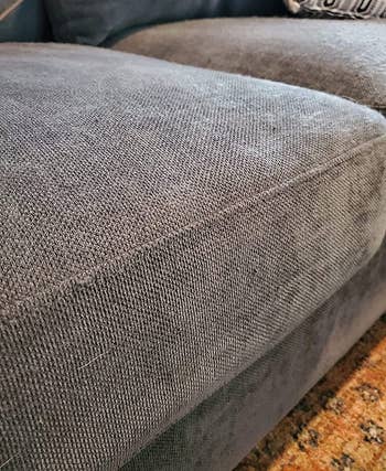 reviewer after image of the same cushion now smooth and free of matted fibers