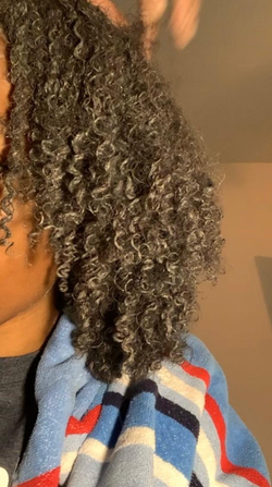 Reviewer's type 4 hair after using the mask, looking defined and clear of buildup 