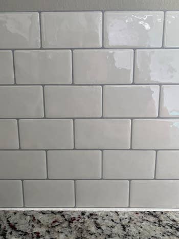 up close of white subway tile