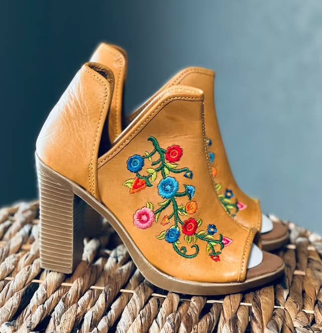 brown open-toe ankle booties with multicolor embroidery 