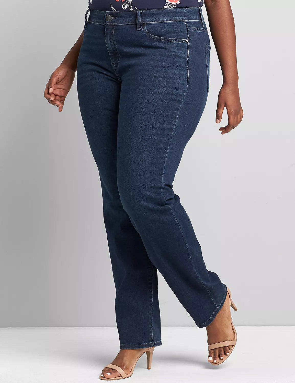 model wearing the dark wash signature jeans with nude heels