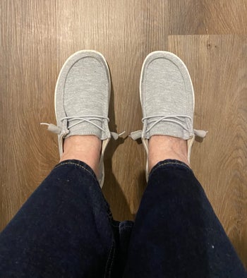 reviewer wearing the shoes in light grey