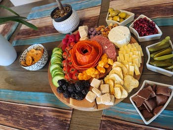 reviewers charcuterie board with food on it and in the bowls