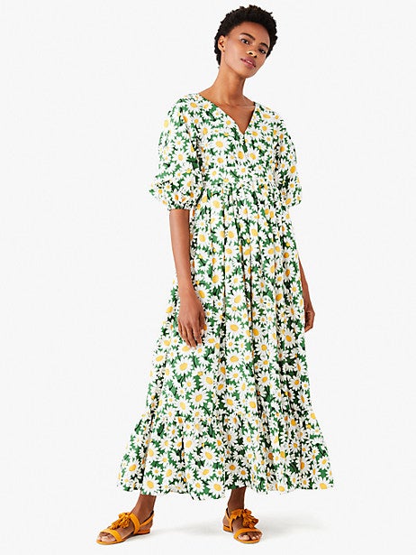 model in green daisy print maxi with elbow sleeves
