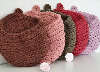 five of the baskets in five different colors 
