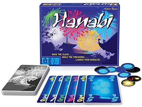 the board game box, playing cards, and round chips with firework art