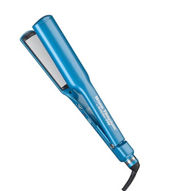 Blue and silver hair straightener with a black cord on a white background