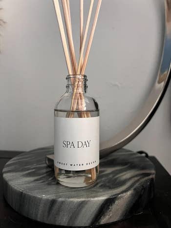 Reed diffuser labeled 