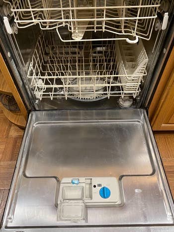 Reviewer photo of the dishwasher with a significantly less amount of water stains