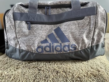 reviewer photo of gray Adidas gym bag