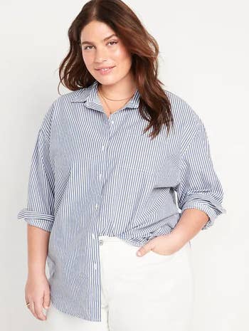 a model wearing the button down shirt with white pants