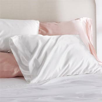 white and pink versions on a bed