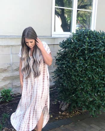 reviewer wearing the maxi dress in brown tie-dye 
