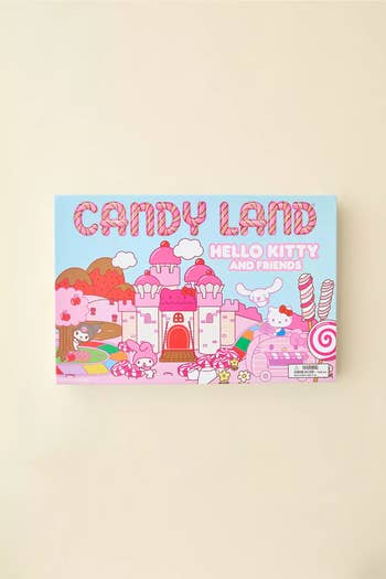 Candy Land committee  crippled  container  featuring Hello Kitty and Friends, with a castle and sweets taxable   illustrated connected  the front