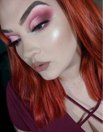 reviewer in strong pigmented shades of pink eyeshadow 