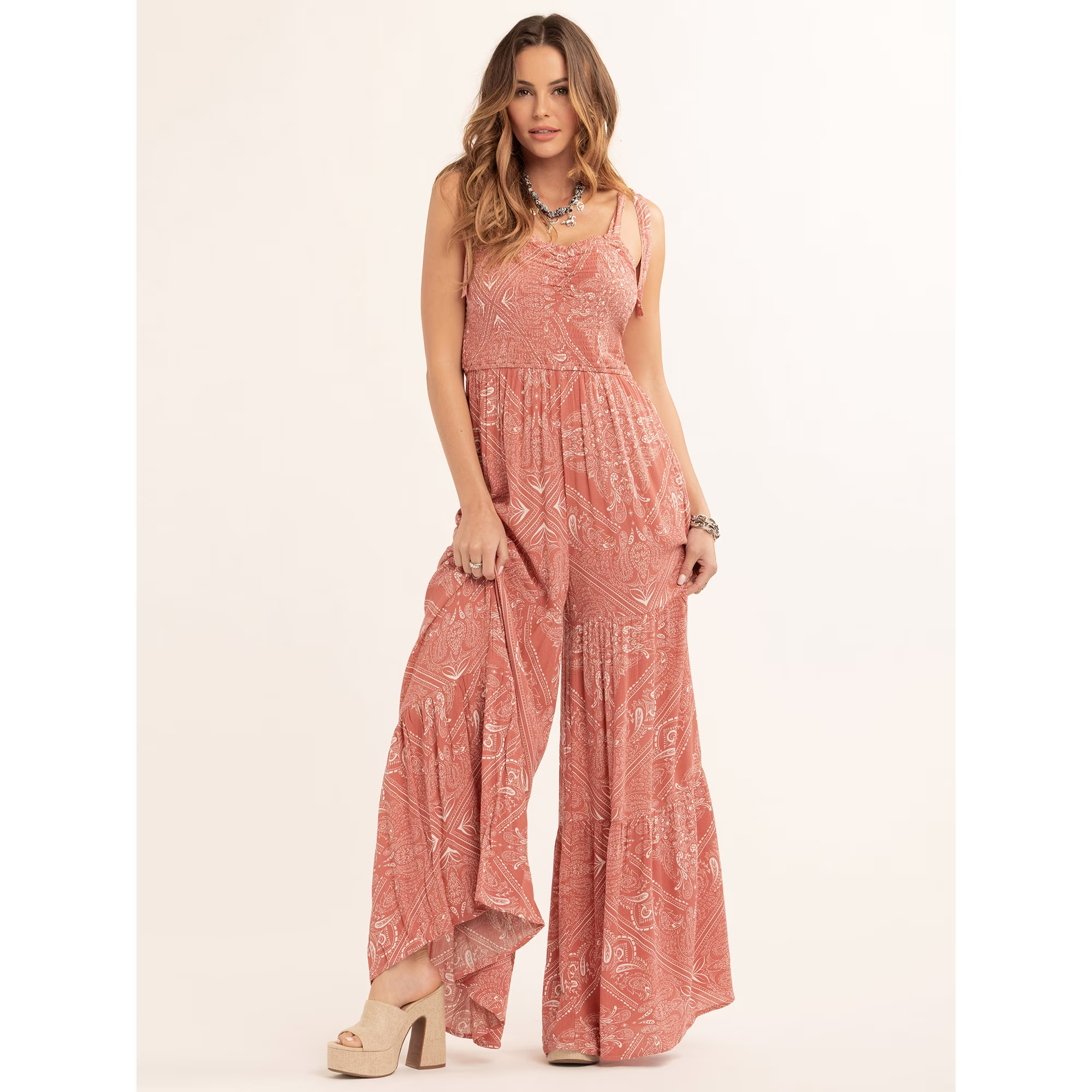 A exemplary  wearing the jumpsuit