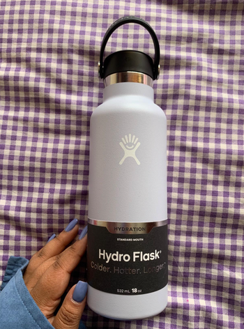 reviewer photo of the water bottle in lavender