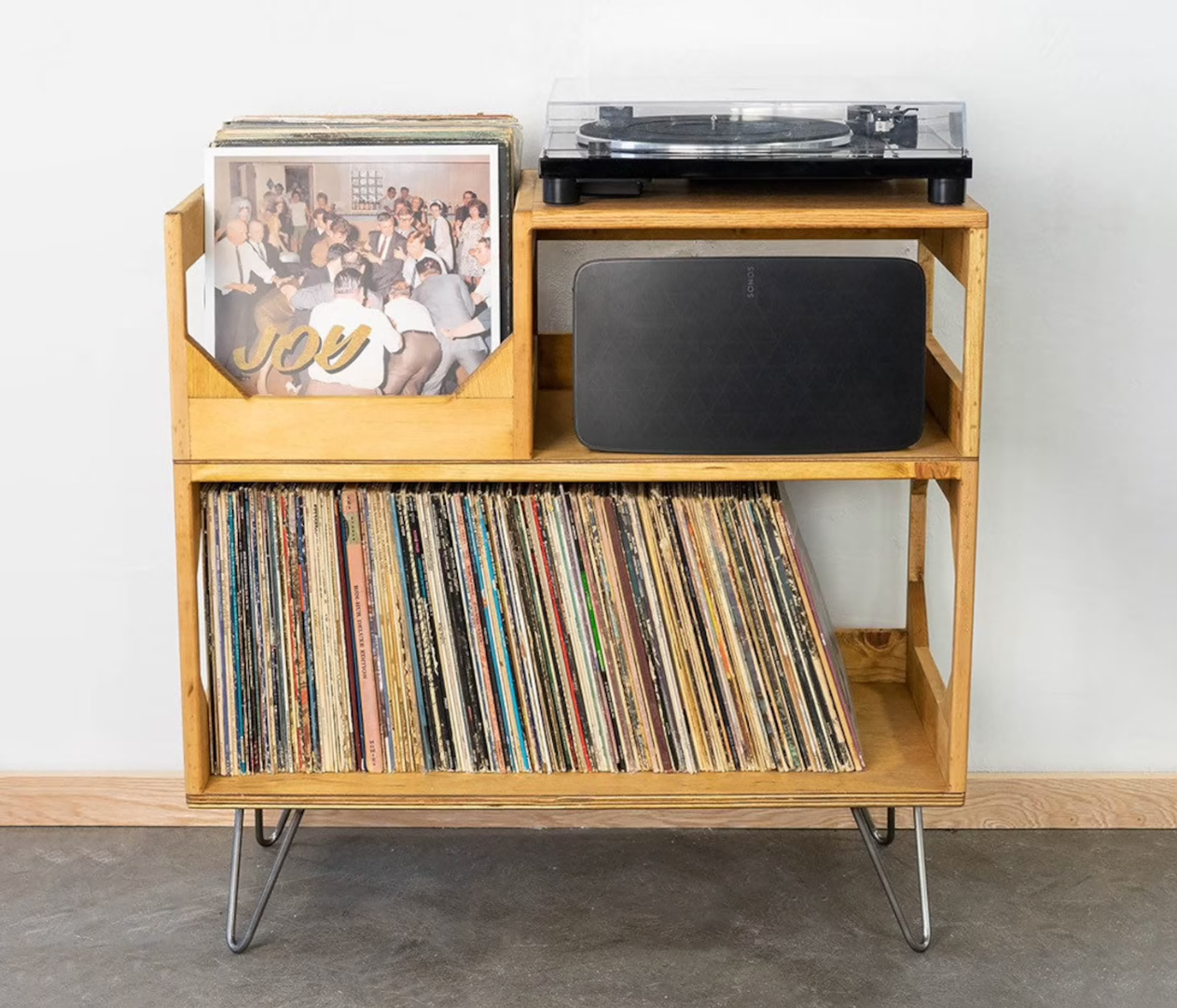 Wooden record player stand with cubby for vinyls and shelf underneath