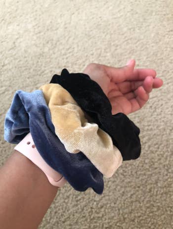 customer photo of all three color scrunchies on wrist