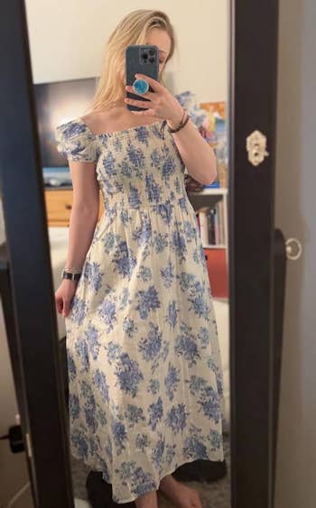BuzzFeed writer wearing the Loft blue and white midi dress, front