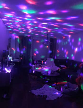 a room with the disco light turned on 
