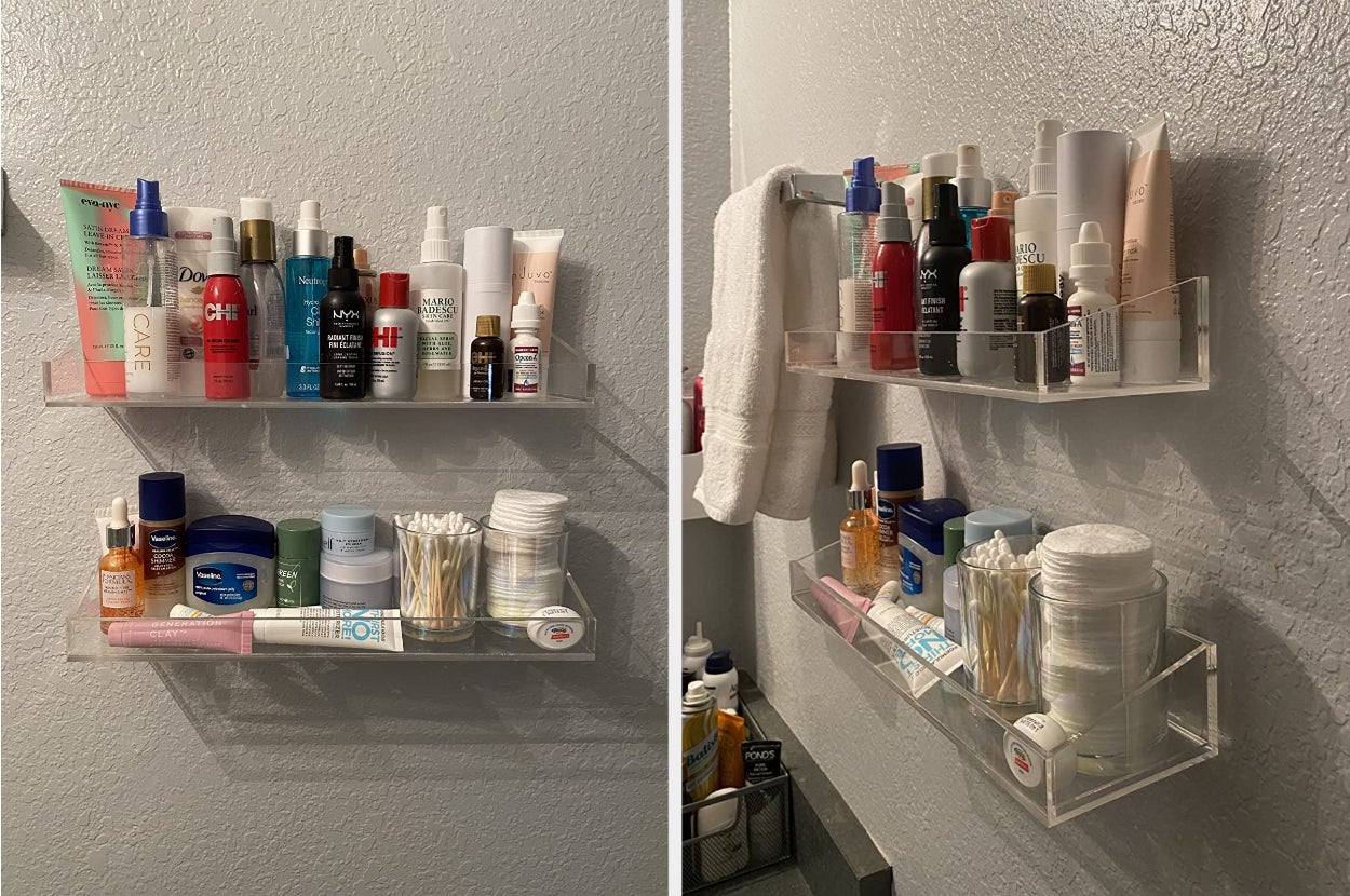Reviewer image of clear acrylic shelves on a white wall with bottles on each one, side view of products next to towel bar