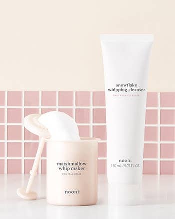 the marshmallow whip maker and the bottle of cleanser