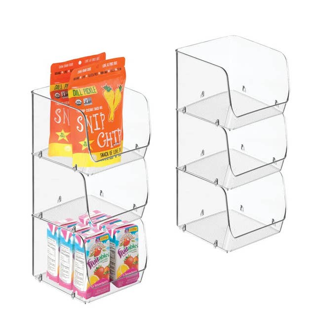 Clear acrylic storage bins displaying snack bags and juice boxes, ideal for organizing kitchen or pantry items