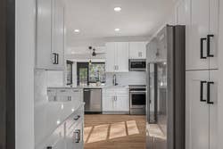 reviewers white cabinets with black handles