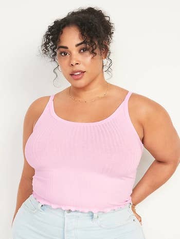 model wearing the pink tank with jeans