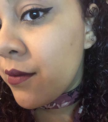 a reviewer wearing the eyeliner stamp 