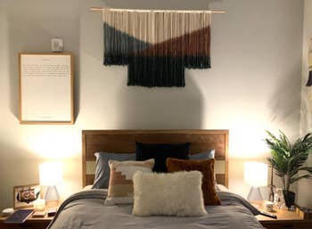 reviewer pic of neutral version of the tapestry above bed